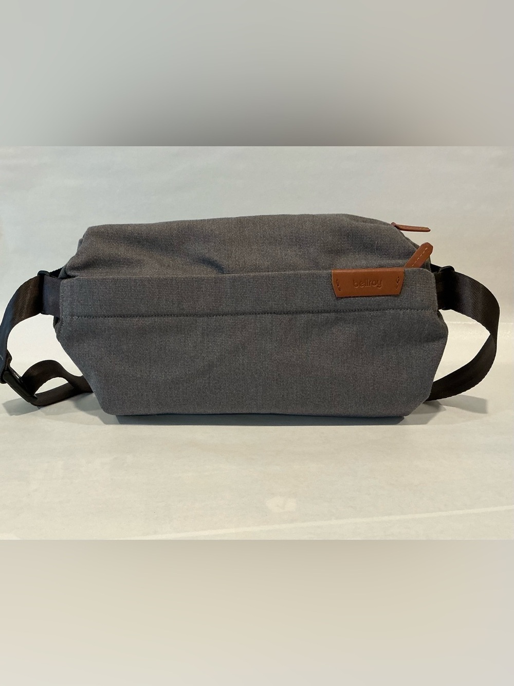 Bellroy Charcoal Gray Sling Belt Bag with Tan Leather Accents